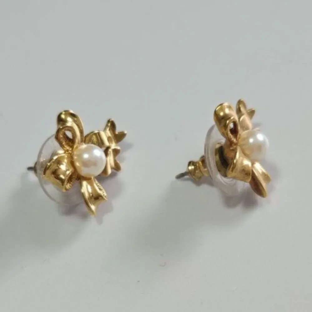 Vintage Avon gold tone bow earrings faux pearl